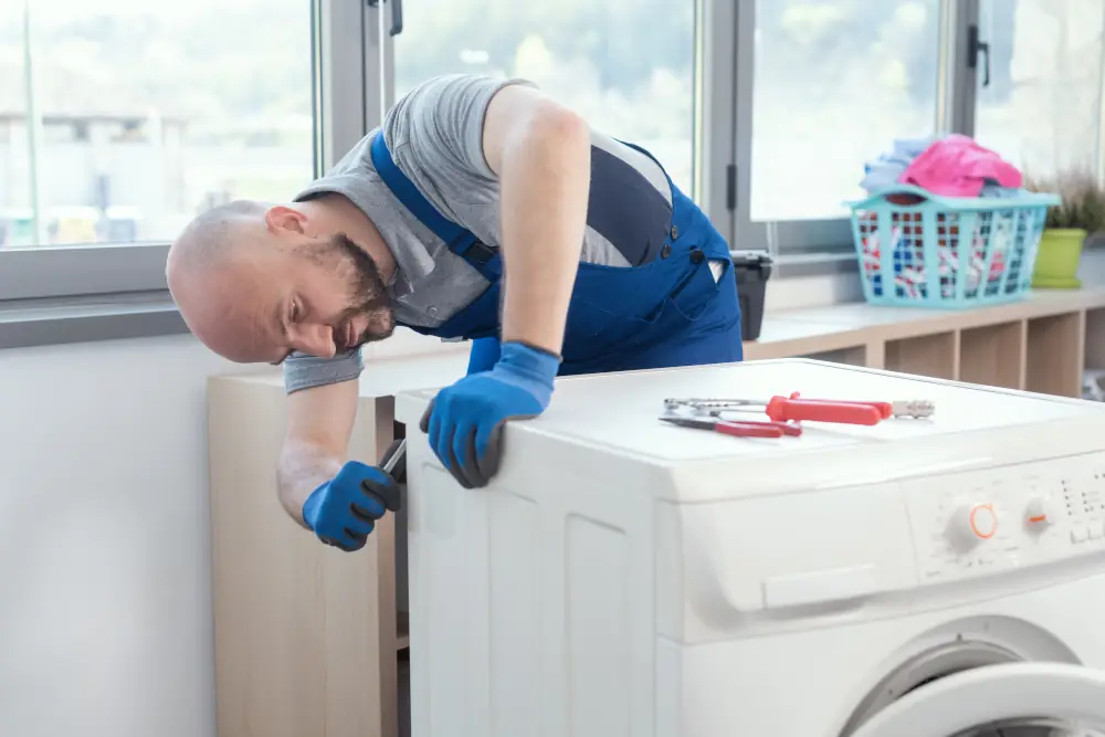 Man installing a dryer