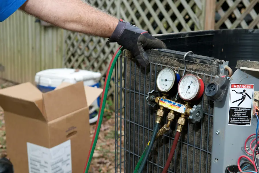 technician installing brand new ac